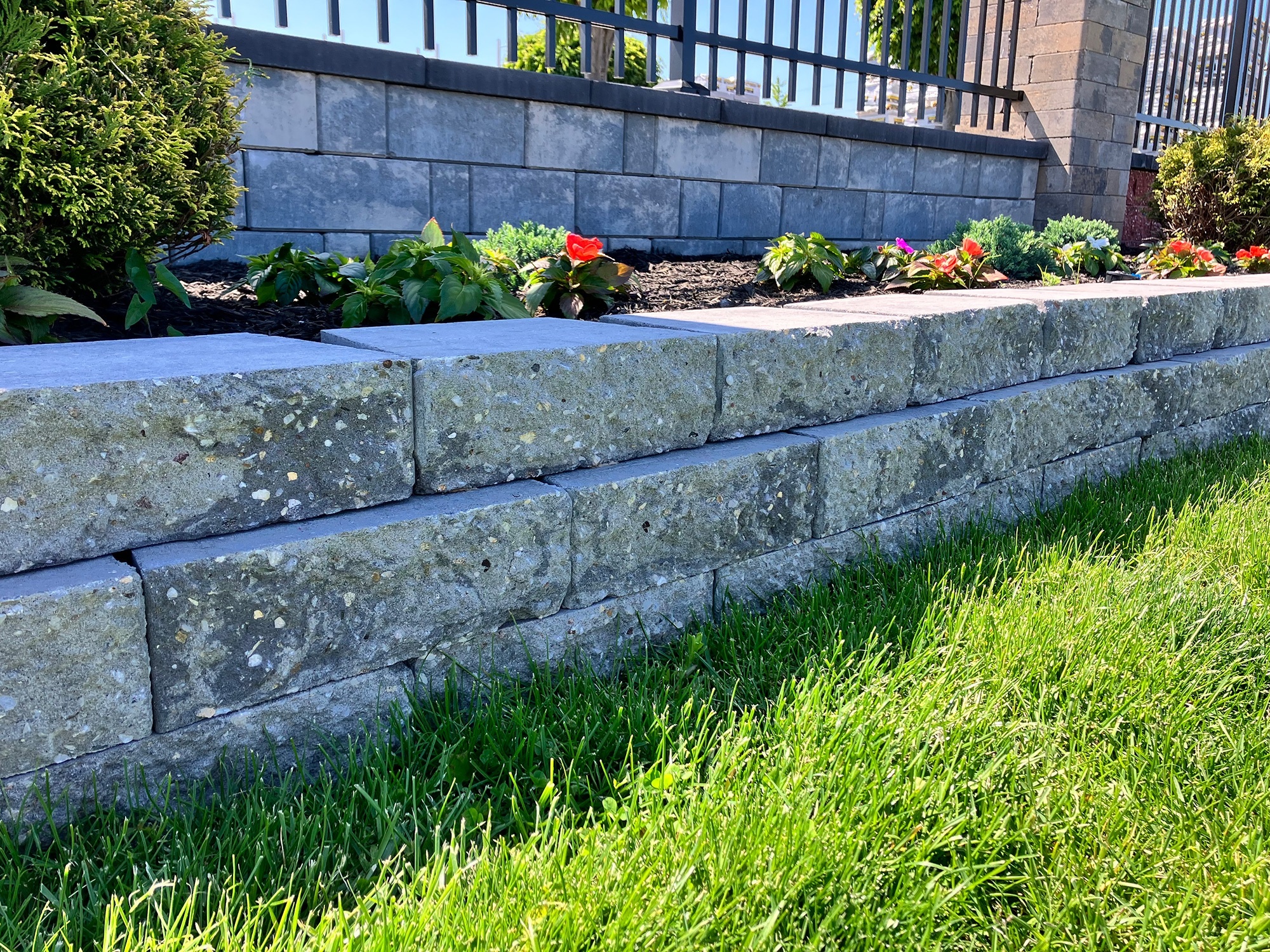 Garden retaining wall with stone blocks