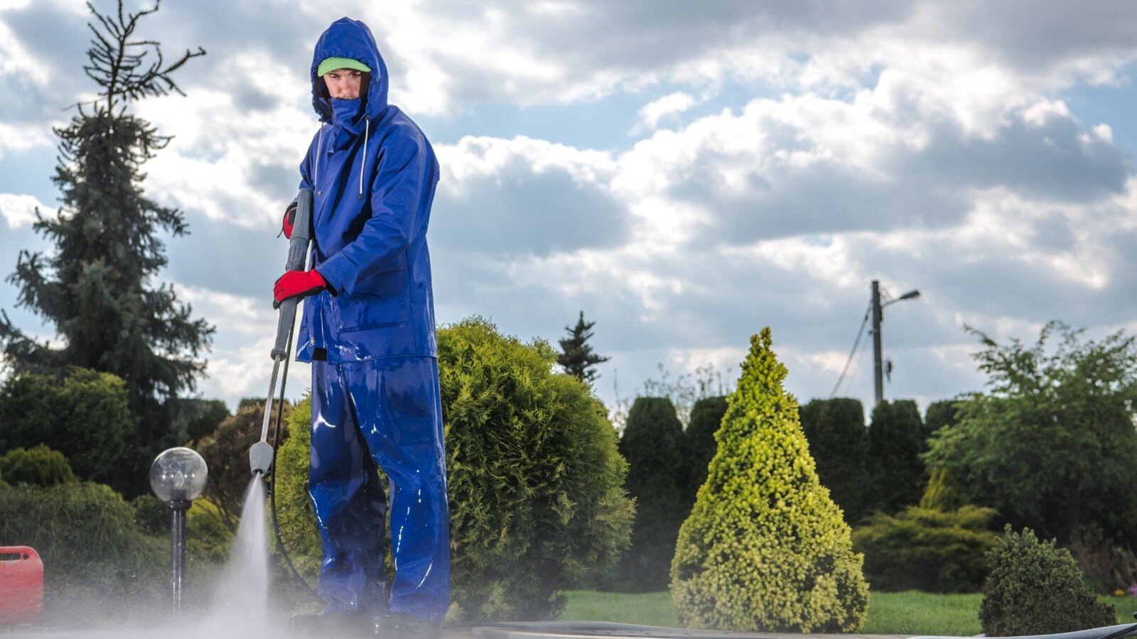Pressure washing a driveway